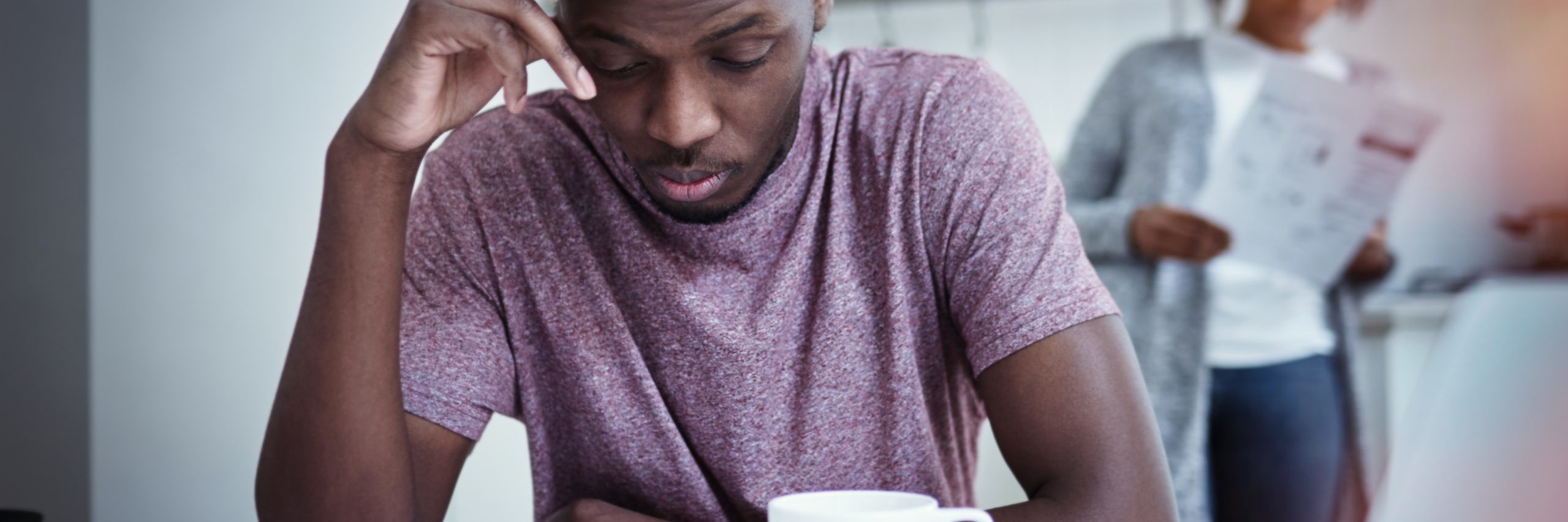 Unhappy,African,American,Family,Financial,Stress:,Black,Man,Sitting,At